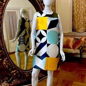 This contemporary high fashion mini dress by MSGM is in soft pastels